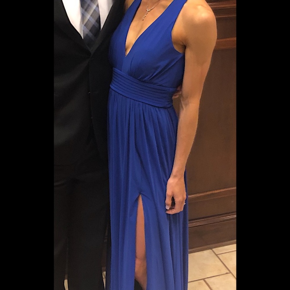 Formal blue maxi dress with slit. Open mid-back.